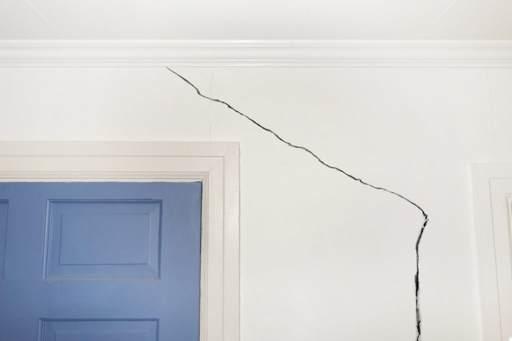 wall cracks by doors